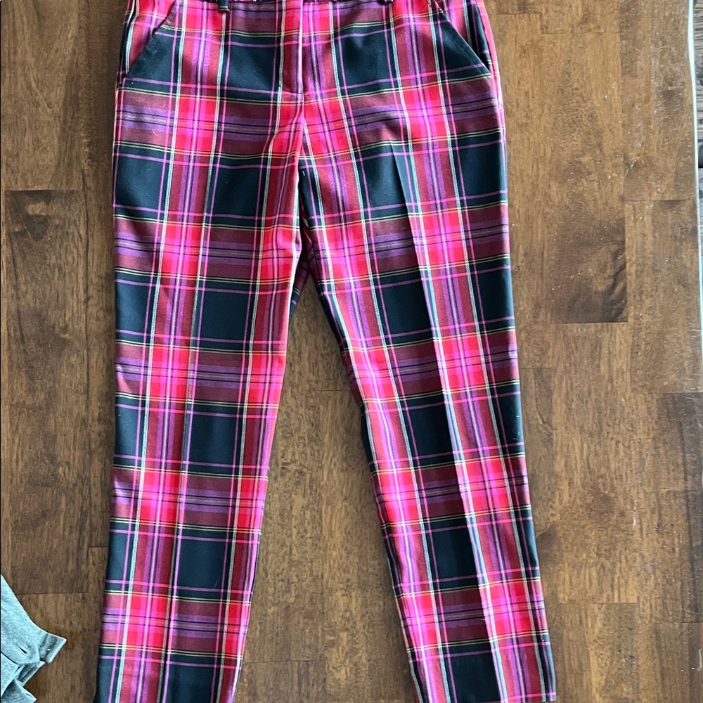 Trina Turk Plaid pants in pink, red, and black plaid
